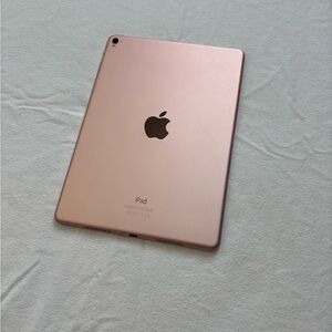 ipad pro 9.7 in rose gold 
~ comes with a keyboard and an otter box case